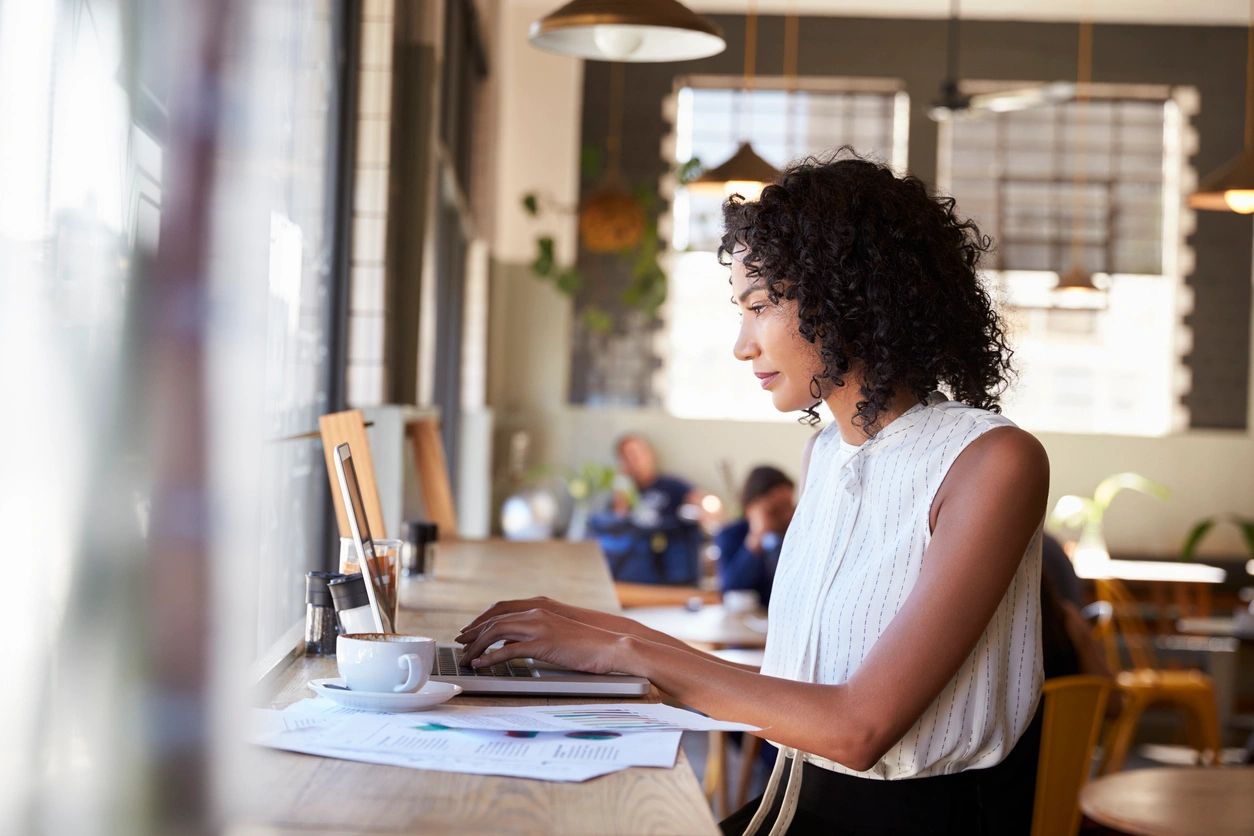 Woman receiving online Christian counseling Christ-centered trauma therapy.